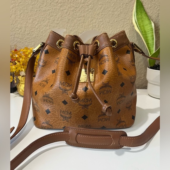 MCM Handbags - MCM SMALL COGNAC VISETOS DRAWSTRING BAG